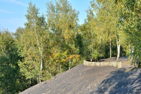 a sloping site cleared for building